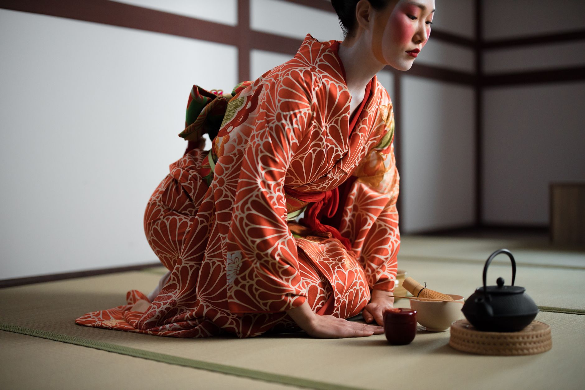 Traditional Japanese tea set on bamboo mat